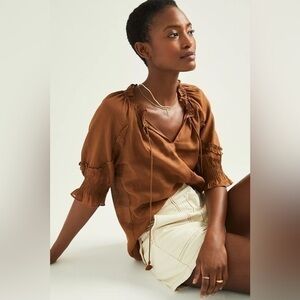 Anthropologie Roma Ruffled Blouse
Daniel Rainn S